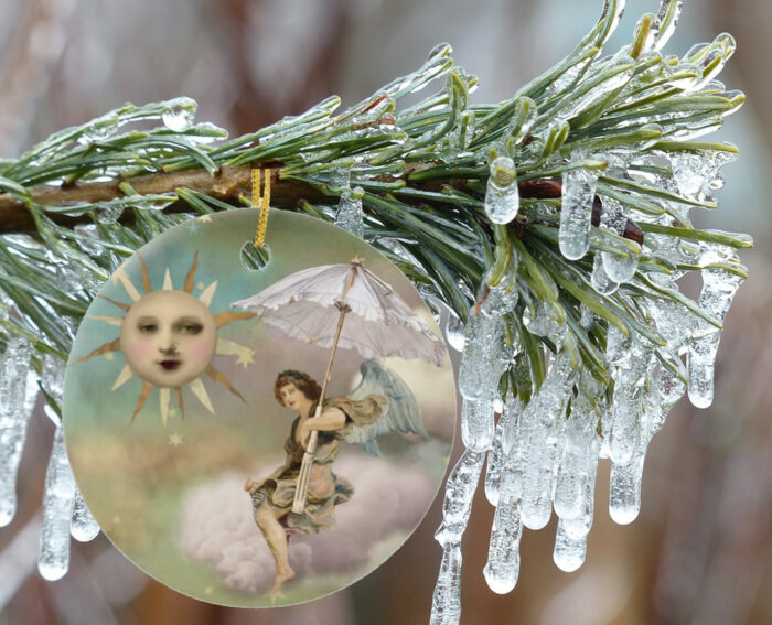 Angel-Under-An-Umbrella-in-the-Sky-Ceramic-Christmas-Ornament-in-situ